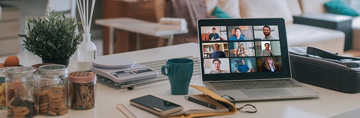 a laptop with a virtual zoom meeting taking place